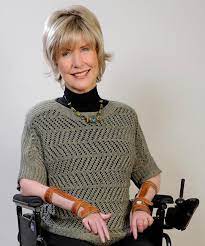 a picture of Joni Eareckson Tada, who is a quadraplegic, sitting in a wheelchair and smiling.